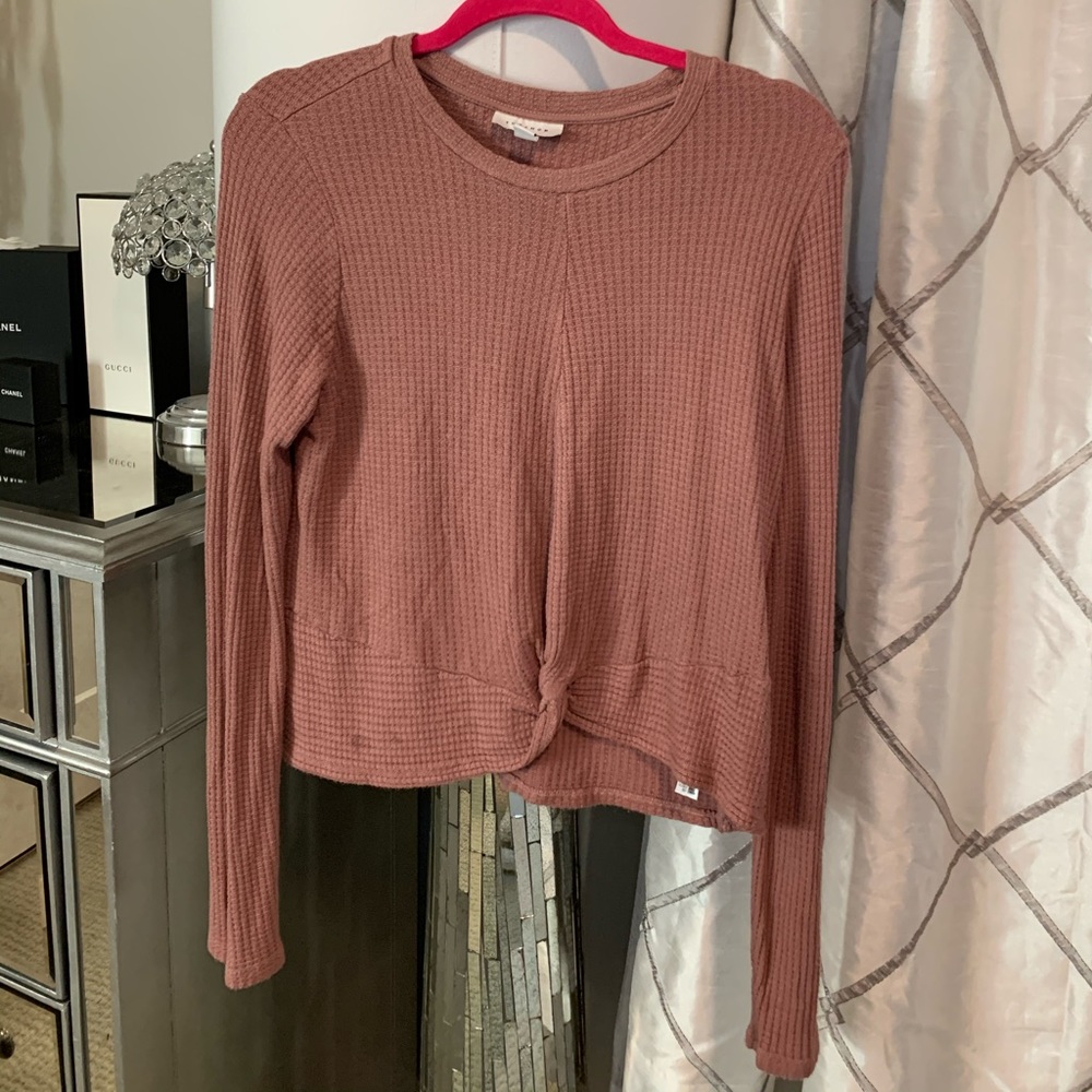 Pink shirt with tie in the front